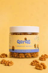 QERAT caramelized walnuts jar with yellow label blue accent on yellow background with scattered walnuts