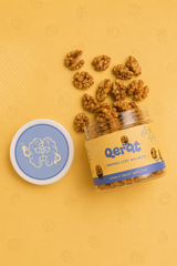 Close-up of QERAT logo on caramelized walnuts jar lid