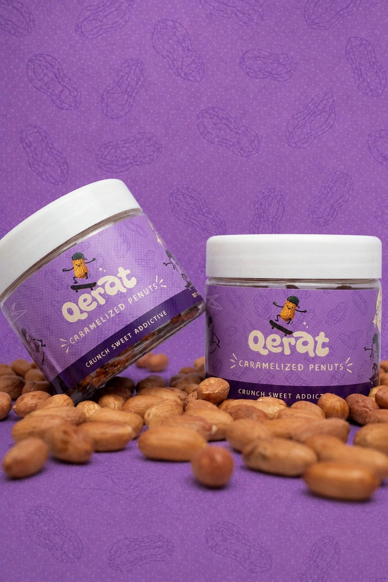 QERAT caramelized peanuts jars displayed with loose peanuts on purple background