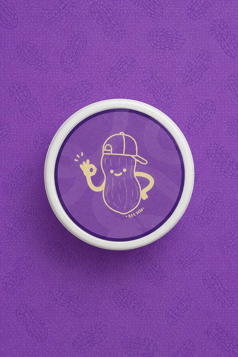 Top view of QERAT caramelized peanuts jar lid with logo