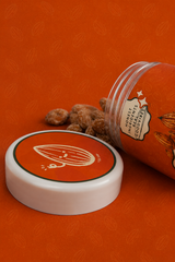 QERAT caramelized almonds jar with lid off showing almond texture