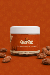 QERAT caramelized almonds jar with orange label on rust orange background with scattered almonds